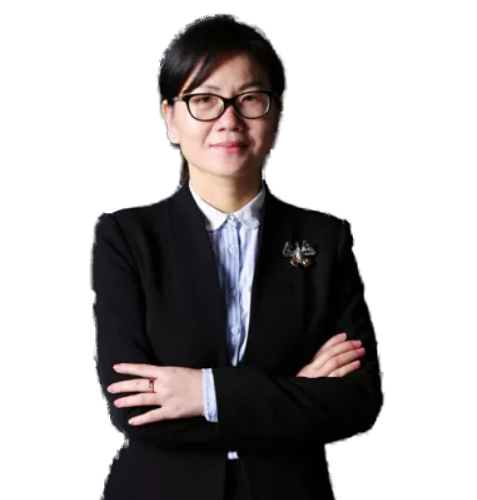 Professional woman with short hair and glasses, arms crossed, wearing a black blazer and light blue shirt.